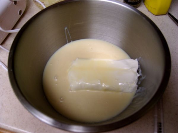 Put cream cheese and condensed milk in bowl to mix