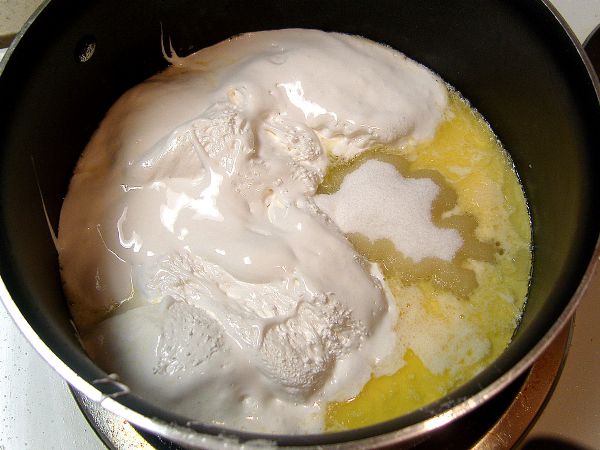 Combine marshmallow cream, sugar, evaporated milk, and salt with the (fudge) butter.