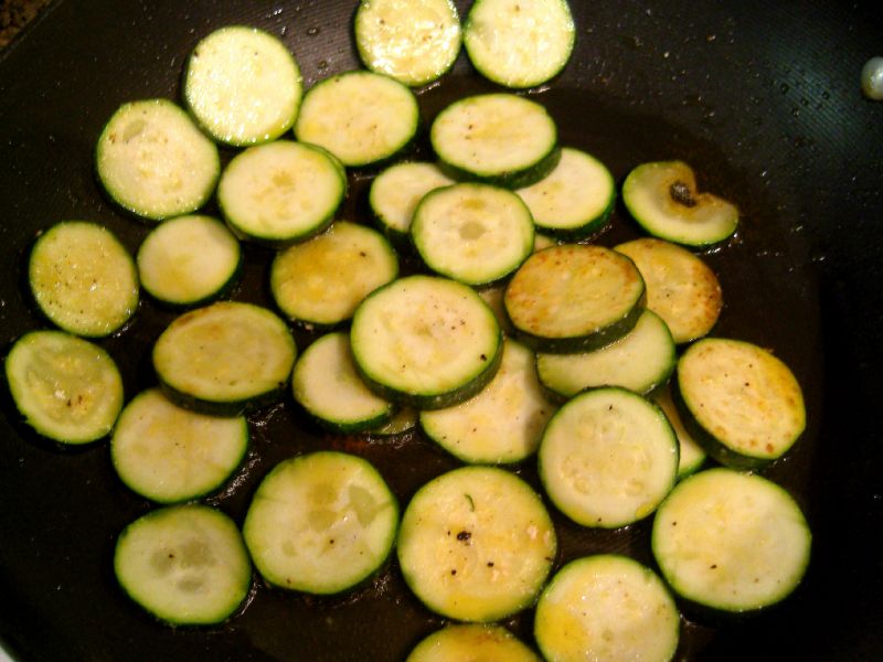 Set chicken aside.  Cook onions and zucchini in oil from the chicken.