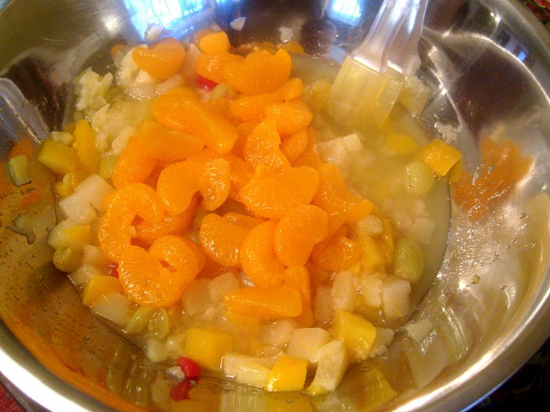 Drain the canned fruits and combine in a bowl (some liquid is OK as you can see).