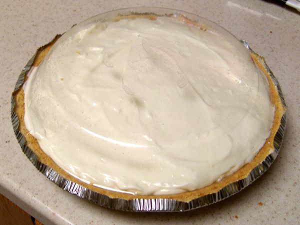 Place pie crust lid over the pie and place in refrigerator for at least 2 hours (I like overnight)