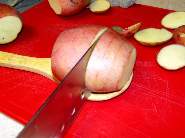 Use wooden spoon to keep from slicing through