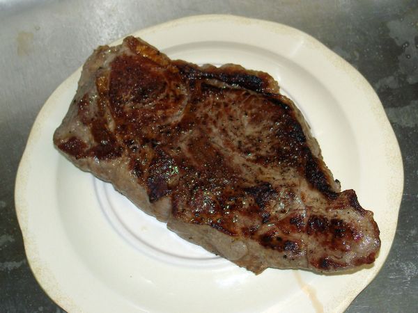 Let rest on a dish to keep steak from steaming in its escaping juices