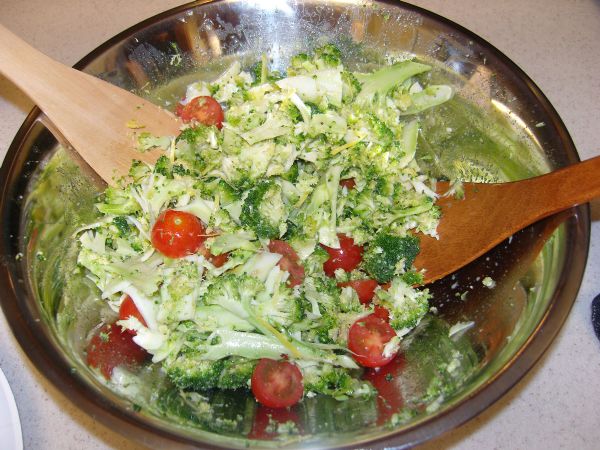 Halve the tomatoes and then add to the broccoli.