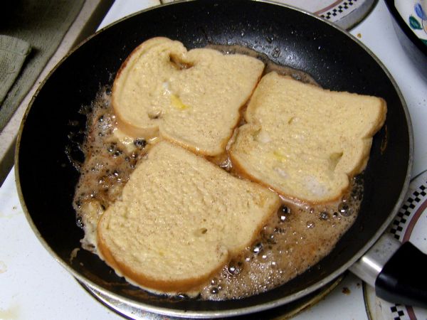 Place bread in melted butter (this picture is from the second batch, which is why the butter is 