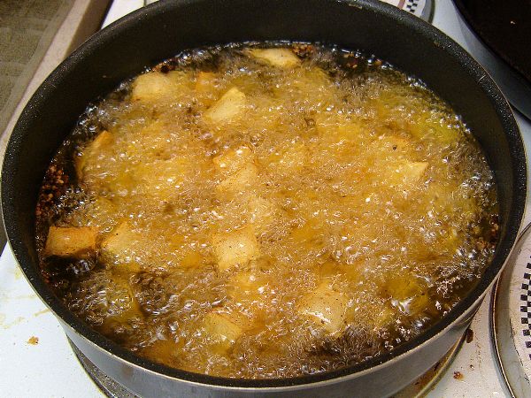 Add to boiling oil.  Cook for around 8 minutes (until golden brown)