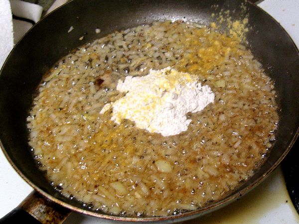 Brown onion in bacon grease.  Add flour and mustard.