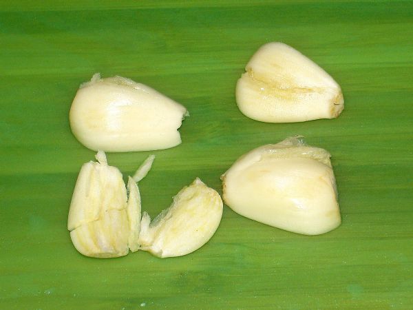 Lightly Crush Garlic (remember, you are going to remove these, so you don't want it too small).