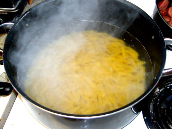 Boil water and add penne