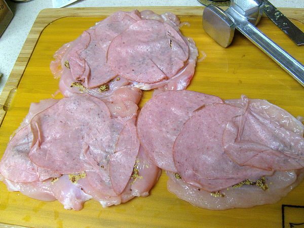 Layer ham on mustard (I use a thin ham - it is easier to cut later)