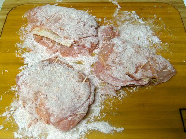 Coat chicken with flour