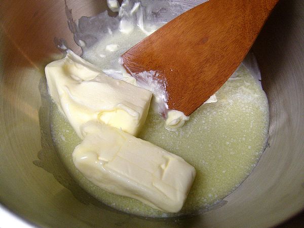 Place butter in a mixing bowl (I microwaved the butter for about a minute to make it soft enough to 