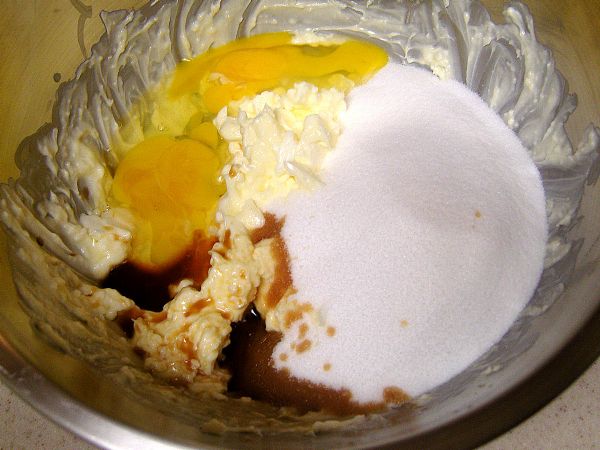 Add sugar, vanilla and eggs.