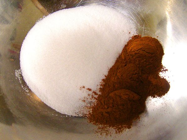 Put sugar and cinnamon in bowl