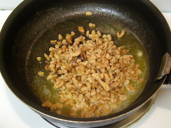 Toast walnuts over low heat while the fudge is cooking.
