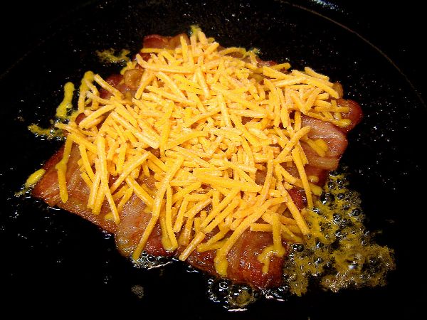 Top with cheese (I used shredded cheddar cheese here)