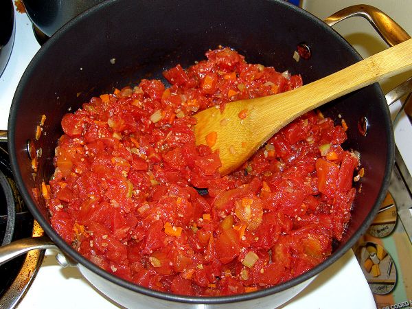 Mix together the tomatoes and the mirepoix.