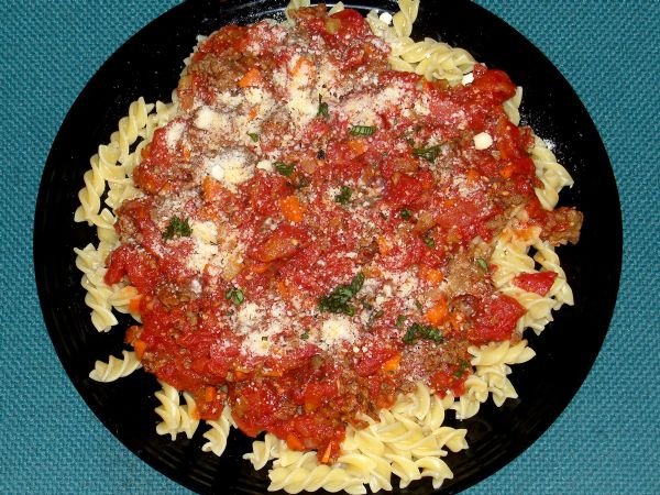 Top with cheese and fresh chopped basil.