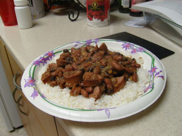 Beans, Sausage and Rice served over a bed of rice