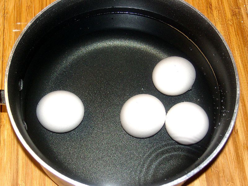 Fill pot with cold water, covering eggs by 1 inch.