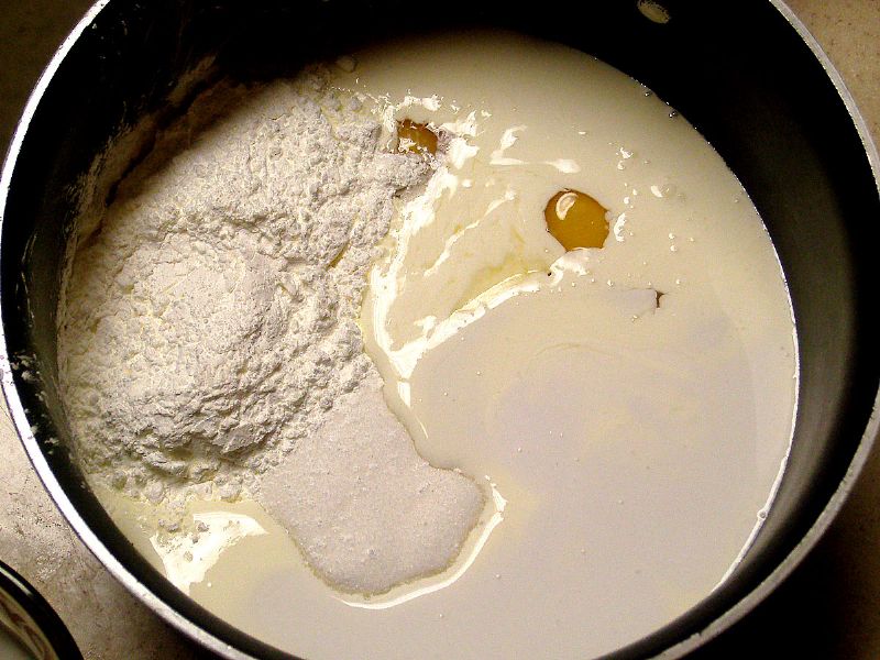 Place cream, eggs, corn starch, sugar, coconut milk and salt in a sauce pan.