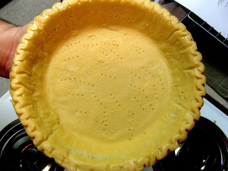 For the frozen pie crust, thaw for at least 10 minutes, poke holes in the bottom and sides, bake at