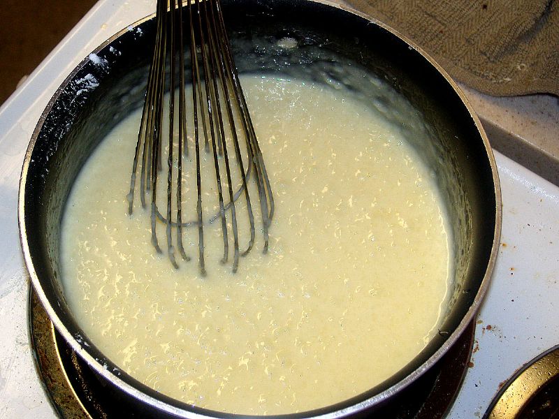 Lumps can form from the corn starch - so switch to whisk if you have to (and keep stirring)