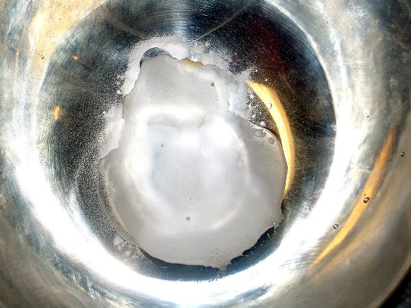 Dissolve baking soda in hot water