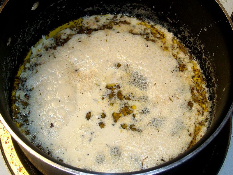 Bring to a simmer, add crushed garlic