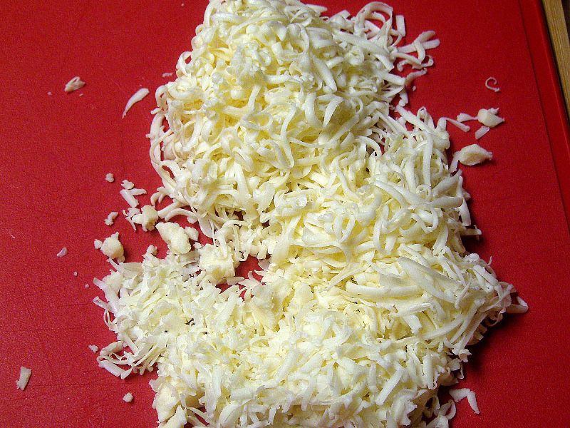 Grate some fresh cheese