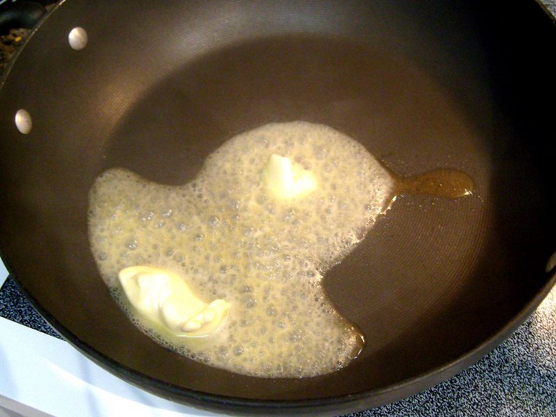 Melt butter in hot skillet