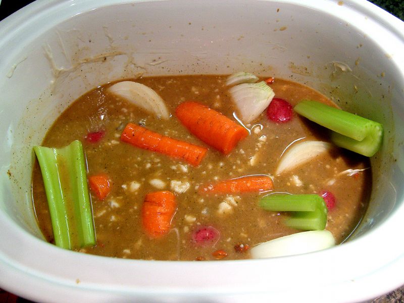 Place half of the vegetables in the soup mixture.