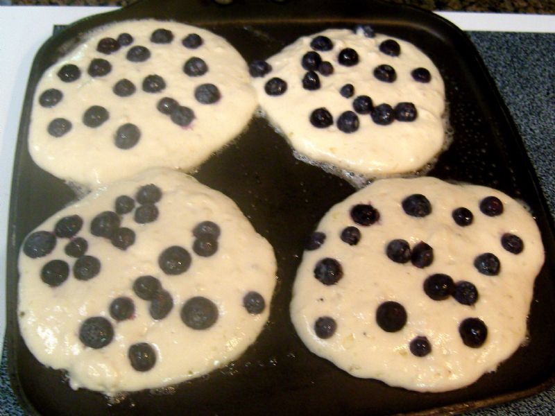 Place the batter on skillet.  Add the blueberries to the top.