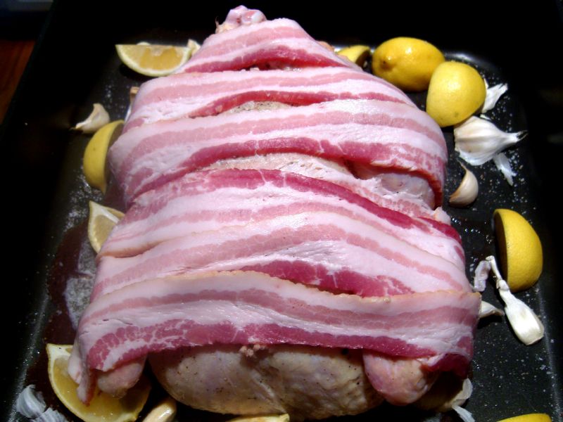 Drape bacon over chicken