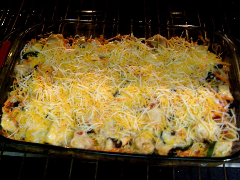 Remove the foil covering.  Add remainder of the cheese and return to oven for 10 minutes.