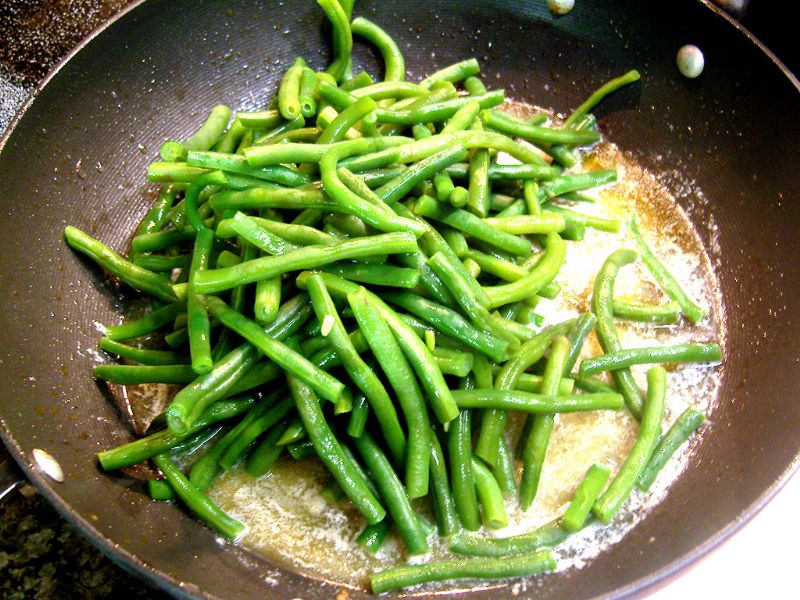 Add Green beans to melted butter