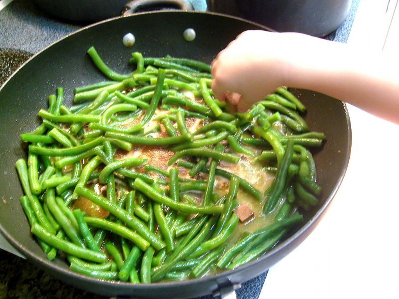 Add soy sauce, bouillon cubes and water (I reserved water from the green bean boiling)
