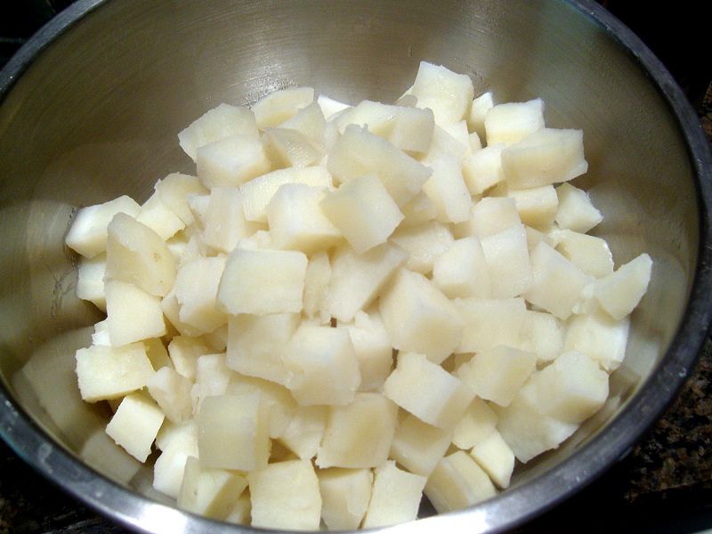 Dice the potatoes and cook them as directed (this is after they are already drained)