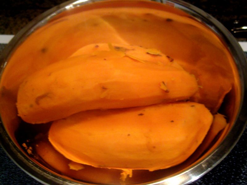 When sweet potatoes are cooked and cooled, peel.