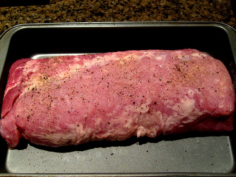 Season tenderloin in pan with salt, pepper, garlic powder and onion powder.