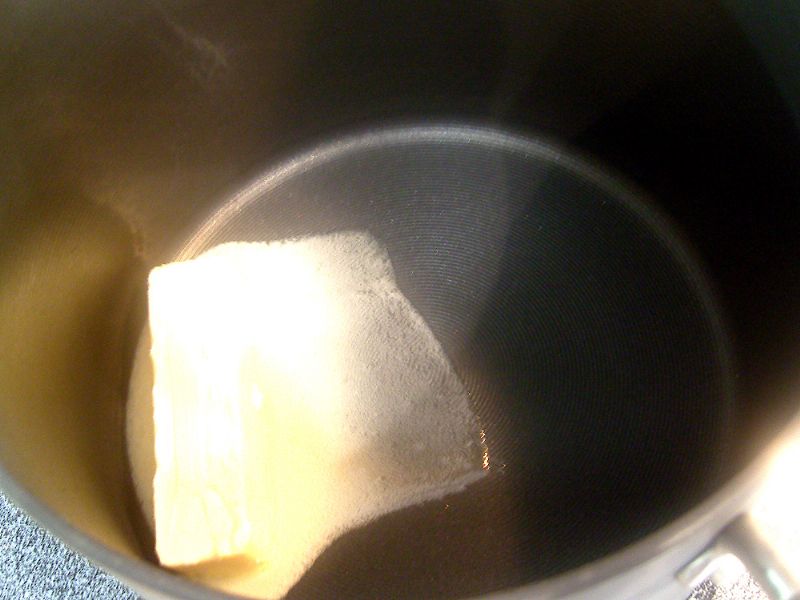 Melt butter in a large stock pot.