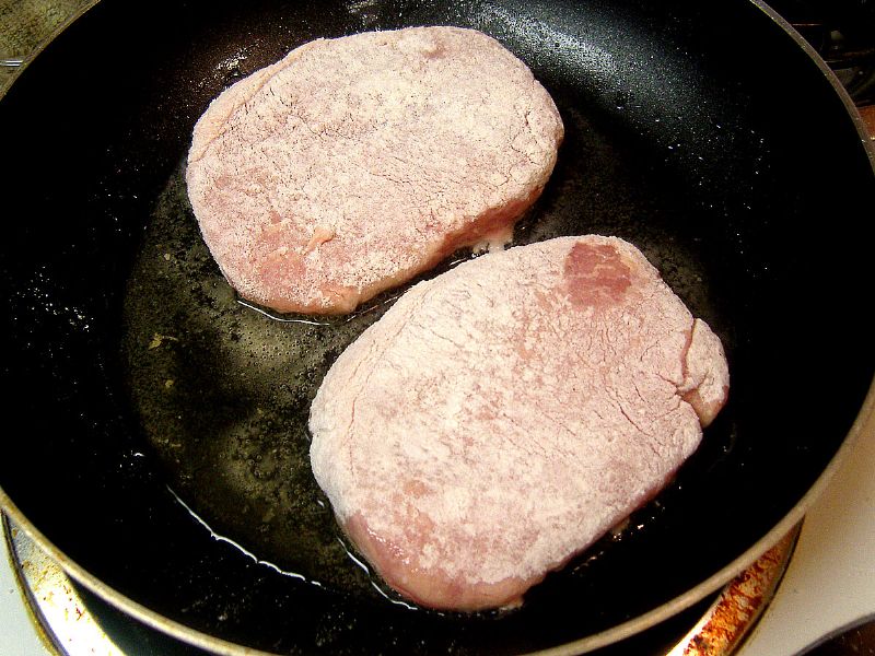 After coating with flour, heat oil and cook chops on medium high heat for 6-8 minutes per side.