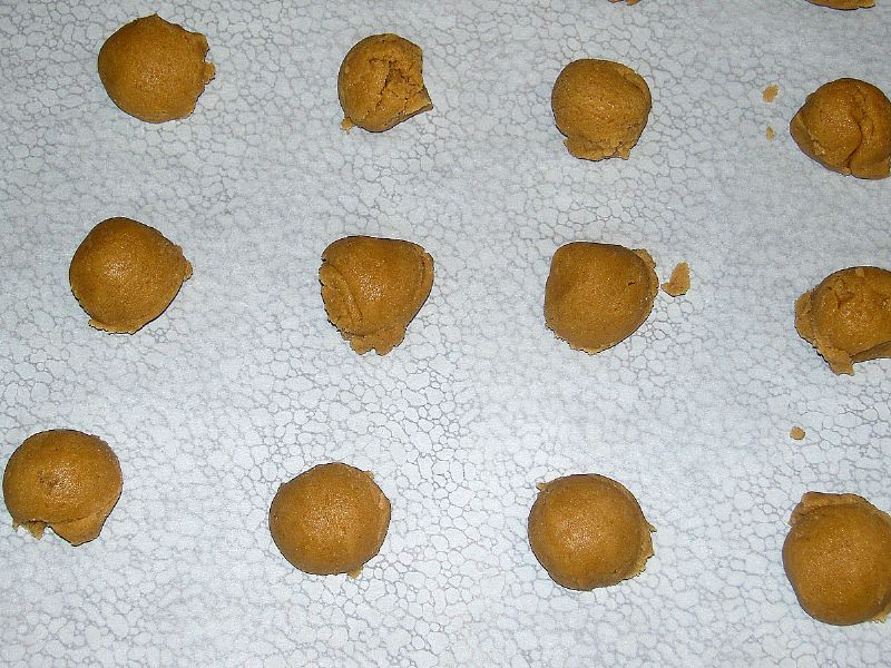 Drop on parchment paper covered cookie baking pan.