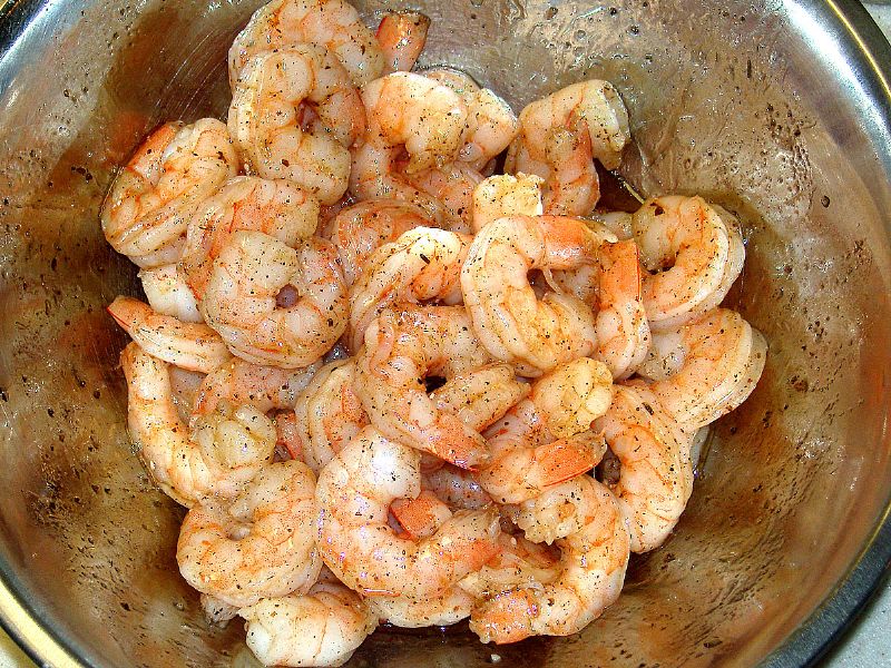 Fully coat the shrimp.