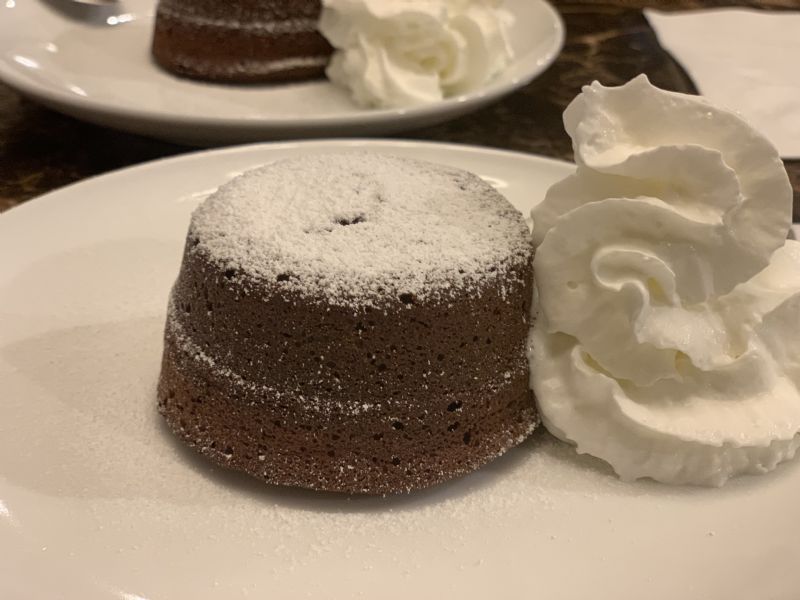 Dust with powdered sugar and add whipped cream