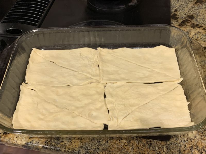 Lay crescent rolls in pan