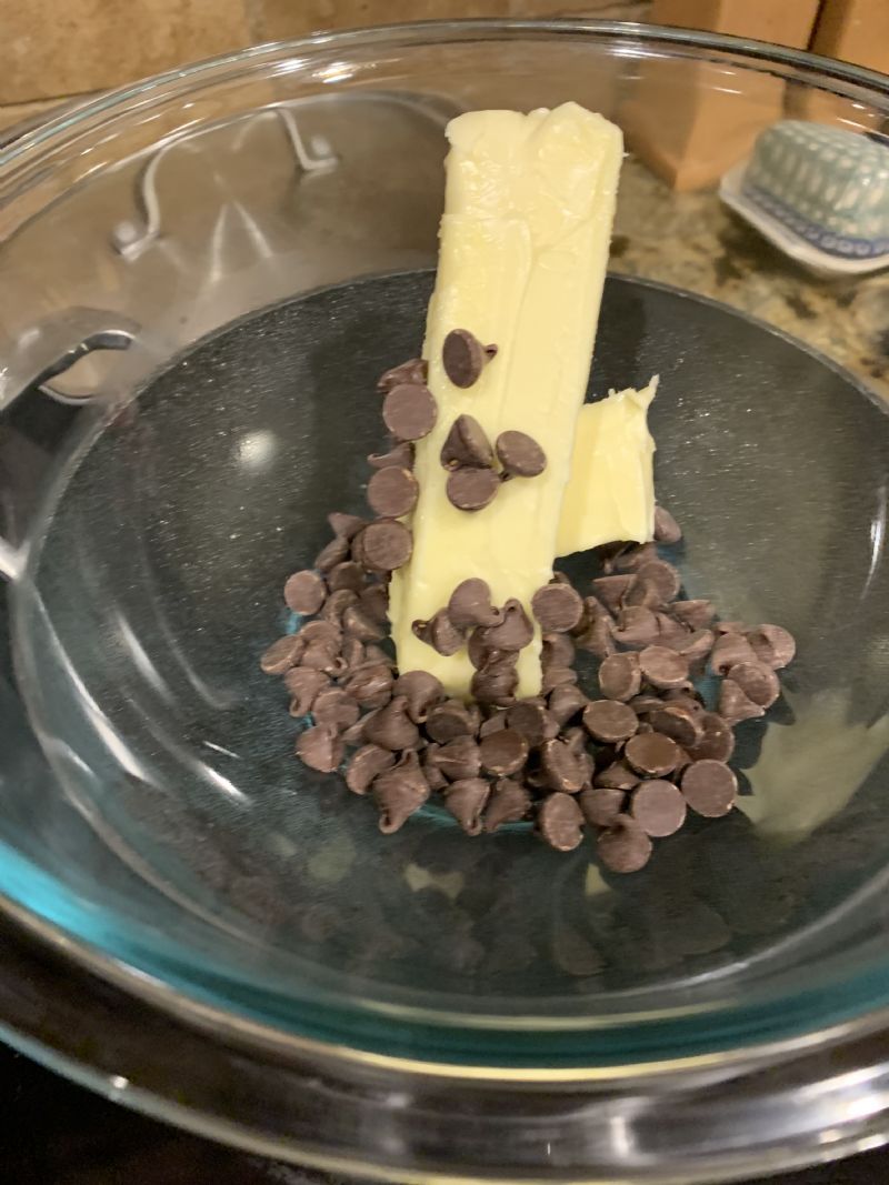 Place butter and chocolate chips in double boiler