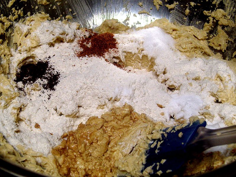 Add in the flour, baking powder, salt, cloves and cinnamon (after adding the vanilla (not shown))